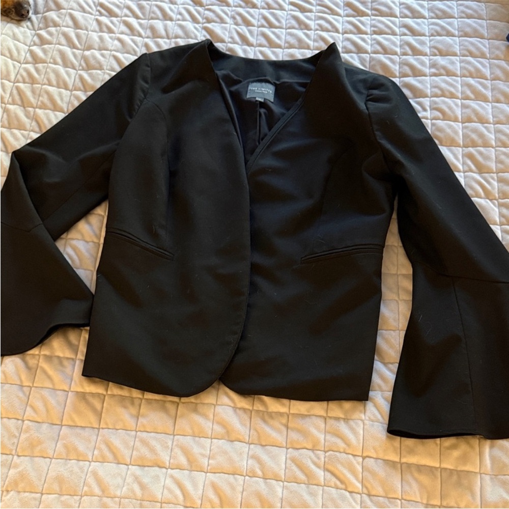 The limited black blazer with bell sleeves